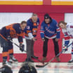 Mark Messier Bryan Trottier perform Stadium Series puck drop